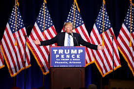 Donald Trump speaking at a rally with student visa policy text overlay